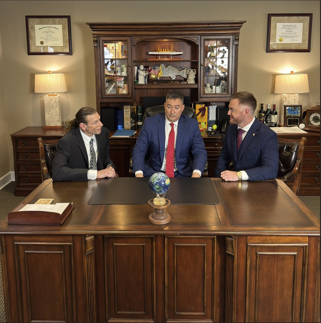 Jeff Gorman, Chris Walsh, and Joe Grant at Jeff Gorman Law Offices in Stuart, Florida