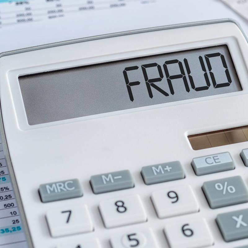 Bank building with digital code overlay, symbolizing financial crime and bank fraud investigation
