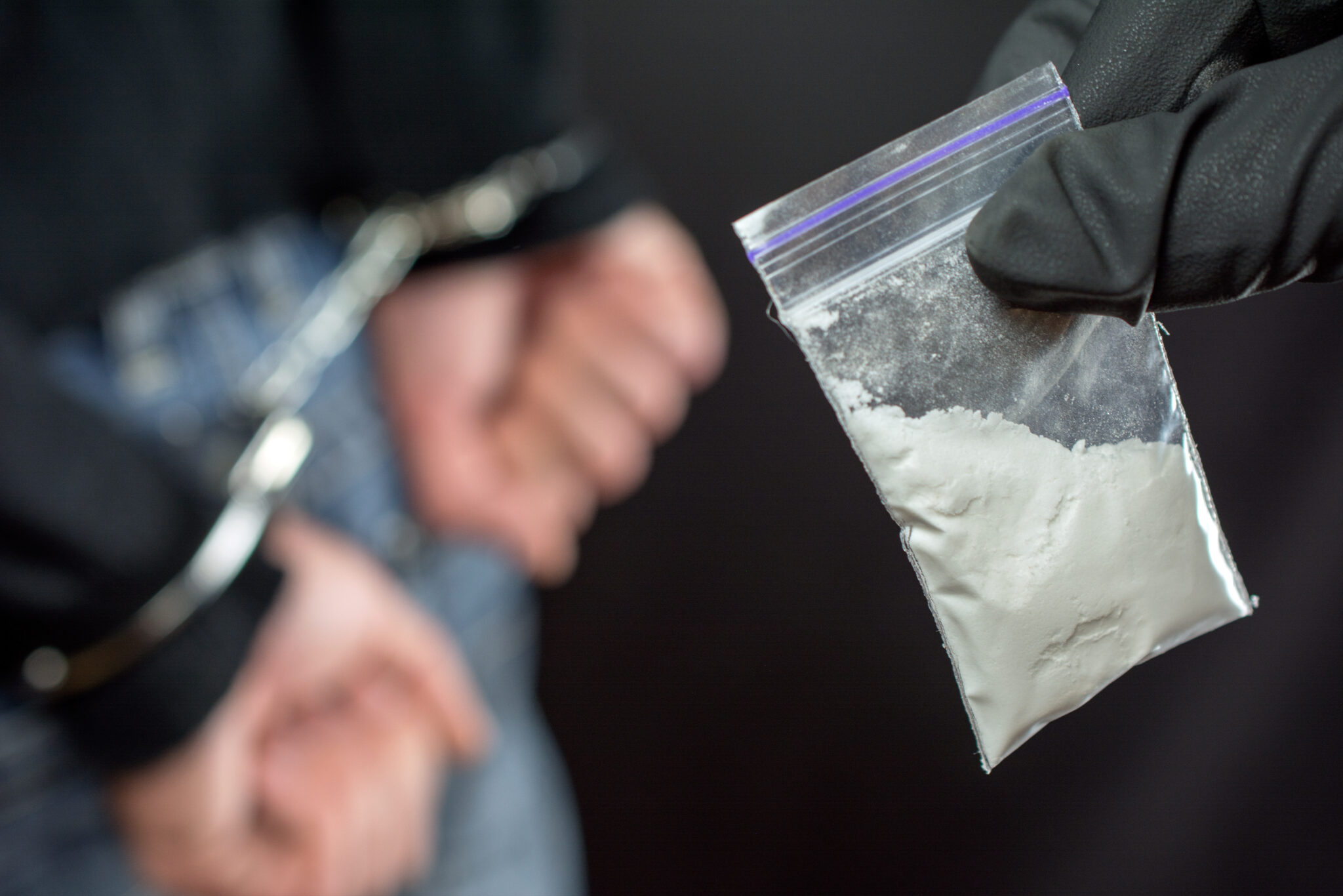 Attorney Jeff Gorman consulting a client about drug crime defense strategies in Florida.