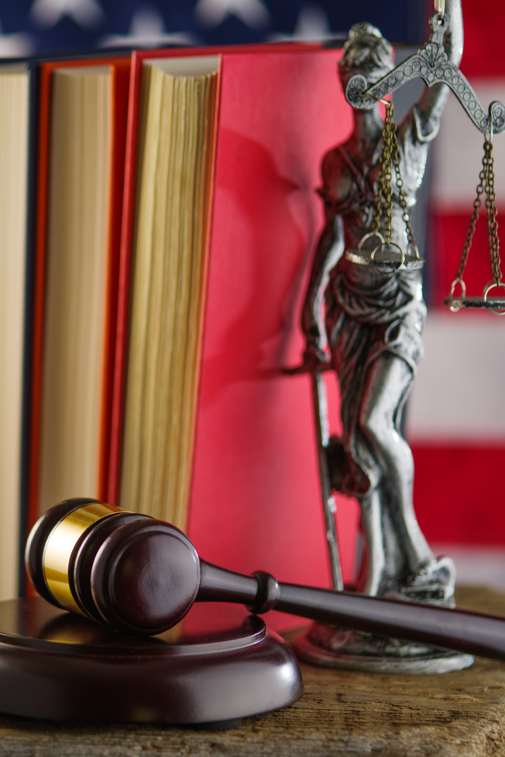 Gavel resting next to a nameplate labeled “Federal Law,” symbolizing federal sentencing in a courtroom